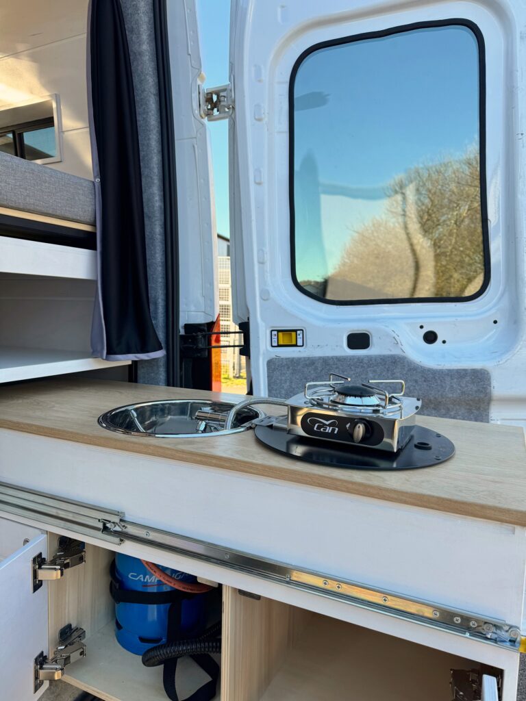 An example of a gas hob installed in a campervan